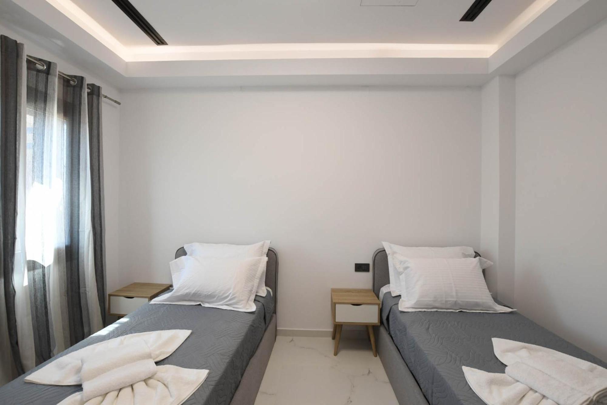 Orion Eco Suites Karteros Quarto foto